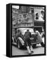 Men Pushing a Car Up a Street, Bilboards Overhead-Carl Mydans-Framed Stretched Canvas
