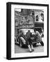 Men Pushing a Car Up a Street, Bilboards Overhead-Carl Mydans-Framed Photographic Print