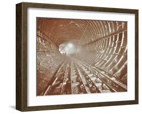 Men Pushing Railway Trucks Along the Rotherhithe Tunnel, Stepney, London, June 1907-null-Framed Premium Photographic Print