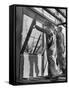 Men Putting Windows In-null-Framed Stretched Canvas
