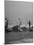 Men Riding the Waves on Surf Boards-null-Mounted Photographic Print