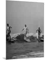 Men Riding the Waves on Surf Boards-null-Mounted Photographic Print