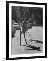 Men Roller Skiing in the Streets-null-Framed Photographic Print