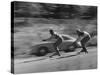 Men Roller Skiing in the Streets-null-Stretched Canvas