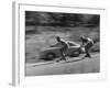 Men Roller Skiing in the Streets-null-Framed Photographic Print