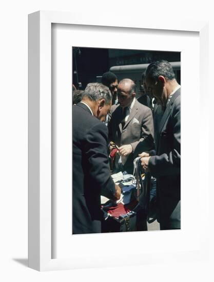 Men Sort Through Neckties in a Vendor's Trunk in the Garment District, New York, New York, 1960-Walter Sanders-Framed Photographic Print