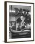 Men Standing in the Window of a Car Dealership-Francis Miller-Framed Photographic Print