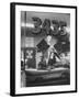 Men Standing in the Window of a Car Dealership-Francis Miller-Framed Photographic Print