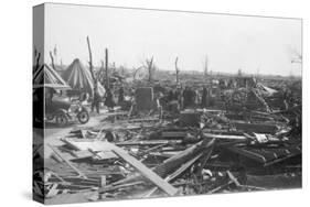 Men Survey Damage Done by Tornado-null-Stretched Canvas