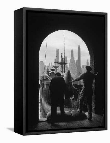 Men Unloading Coffee at Brooklyn Dock. View of Downtown Manhattan in Background-Andreas Feininger-Framed Stretched Canvas