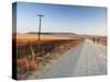 Men Walking on Dirt Road at Dawn, Winterton, Kwazulu-Natal, South Africa-Ian Trower-Stretched Canvas