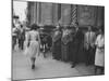 Men Watching Actress Gina Lollobrigida Walk Past-Peter Stackpole-Mounted Premium Photographic Print