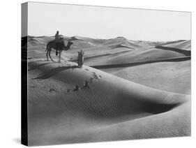 Men with Camel Traveling the Sahara Desert-null-Stretched Canvas