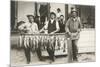 Men with Row of Caught Fish-null-Mounted Premium Giclee Print