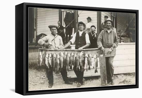 Men with Row of Caught Fish-null-Framed Stretched Canvas
