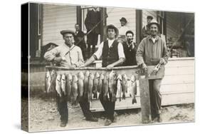 Men with Row of Caught Fish-null-Stretched Canvas