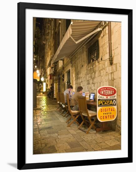 Men working at outdoor internet café, Dubrovnik, Dalmatia, Croatia-Merrill Images-Framed Photographic Print
