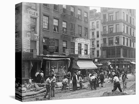 Men Working on Canal Street-null-Stretched Canvas