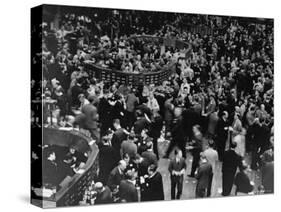 Men Working on the Floor of the New York Stock Exchange-Carl Mydans-Stretched Canvas