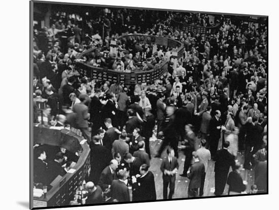 Men Working on the Floor of the New York Stock Exchange-Carl Mydans-Mounted Photographic Print