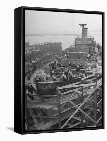 Men Working on the Liberty Ship in the Kaiser Shipyard-Hansel Mieth-Framed Stretched Canvas