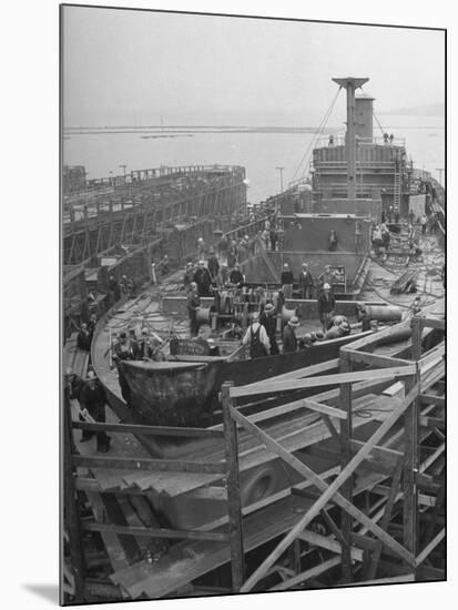 Men Working on the Liberty Ship in the Kaiser Shipyard-Hansel Mieth-Mounted Photographic Print