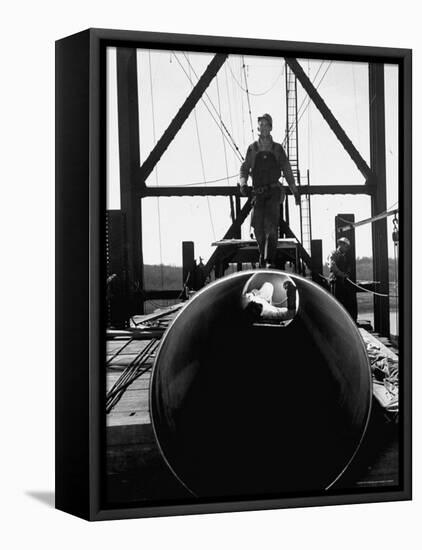 Men Working on the Texas Illinois Natural Gas Company's Pipeline Suspension Bridge-John Dominis-Framed Stretched Canvas