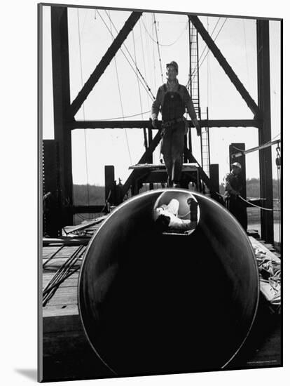 Men Working on the Texas Illinois Natural Gas Company's Pipeline Suspension Bridge-John Dominis-Mounted Photographic Print
