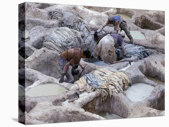 Men Working Tannery Vats in the Medina, Fes, Morocco-Merrill Images-Stretched Canvas