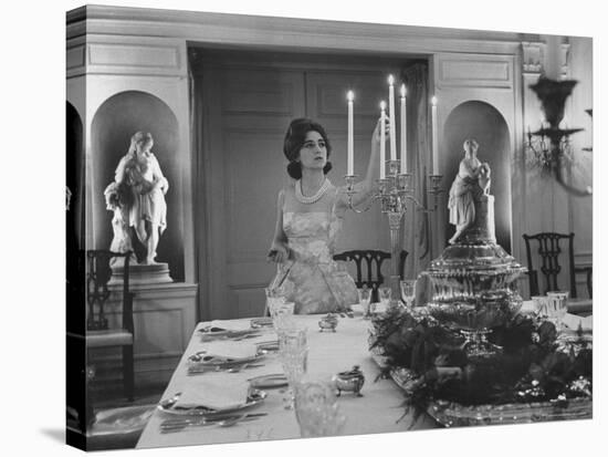 Mercedes de Areilza, Daughter of Spanish Ambassador to Un, Preparing for Dinner Party-Nina Leen-Stretched Canvas