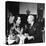 Merle Oberon and Walter Winchell Chatting at the Stork Club-null-Stretched Canvas