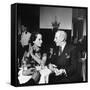 Merle Oberon and Walter Winchell Chatting at the Stork Club-null-Framed Stretched Canvas