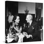 Merle Oberon and Walter Winchell Chatting at the Stork Club-null-Stretched Canvas