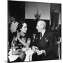 Merle Oberon and Walter Winchell Chatting at the Stork Club-null-Mounted Photographic Print