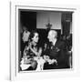 Merle Oberon and Walter Winchell Chatting at the Stork Club-null-Framed Photographic Print