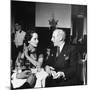 Merle Oberon and Walter Winchell Chatting at the Stork Club-null-Mounted Photographic Print