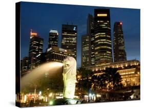 Merlion Fountain with Statue of Half Lion and Fish, with City Buildings Beyond, Southeast Asia-Richard Nebesky-Stretched Canvas