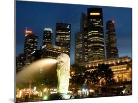 Merlion Fountain with Statue of Half Lion and Fish, with City Buildings Beyond, Southeast Asia-Richard Nebesky-Mounted Photographic Print