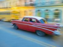 Caribbean, Cuba, Havana, Havana Vieja, UNESCO World Heritage Site, classic car in motion-Merrill Images-Photographic Print