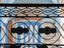 Cuba, Camaguey, UNESCO World Heritage Site, wrought iron grill in giant window of colonial mansion-Merrill Images-Laminated Photographic Print