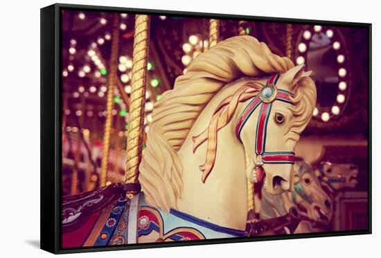 Merry-Go-Round Wooden Horses Toned with a Retro Vintage Instagram Filter Effect-graphicphoto-Framed Stretched Canvas