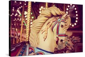 Merry-Go-Round Wooden Horses Toned with a Retro Vintage Instagram Filter Effect-graphicphoto-Stretched Canvas