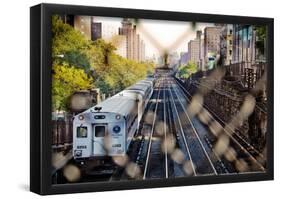 Metro North Train Through Fence-null-Framed Poster