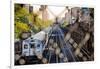 Metro North Train Through Fence-null-Framed Photo