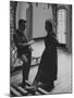 Mexican Actor Manolo Fabregas Talking with Actress Maria Felix Between Takes of Her Film-Allan Grant-Mounted Premium Photographic Print