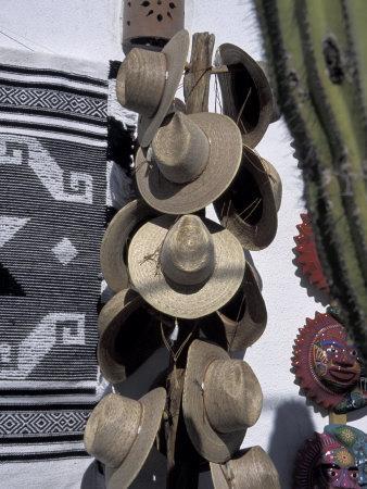 https://imgc.allpostersimages.com/img/posters/mexican-handicrafts-straw-hats-and-cactus-todos-santos-baja-mexico_u-L-P2TYUY0.jpg?artPerspective=n