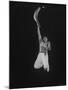 Mexican Jai Alai Player Segundo Jumping to Reach Pelota in Game at Hippodrome-Gjon Mili-Mounted Premium Photographic Print