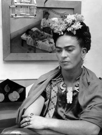 https://imgc.allpostersimages.com/img/posters/mexican-painter-frida-kahlo-1907-1954-1948_u-L-PWGKJG0.jpg?artPerspective=n