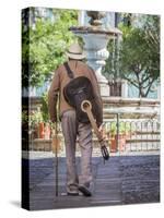 Mexico, Guanajuato. Elderly Man Walking with Guitar-Jaynes Gallery-Stretched Canvas