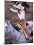 Mexico, Jalisco, Puerto Vallarta Cowboy attempts to rope a bull at the charro, rodeo-Merrill Images-Mounted Premium Photographic Print